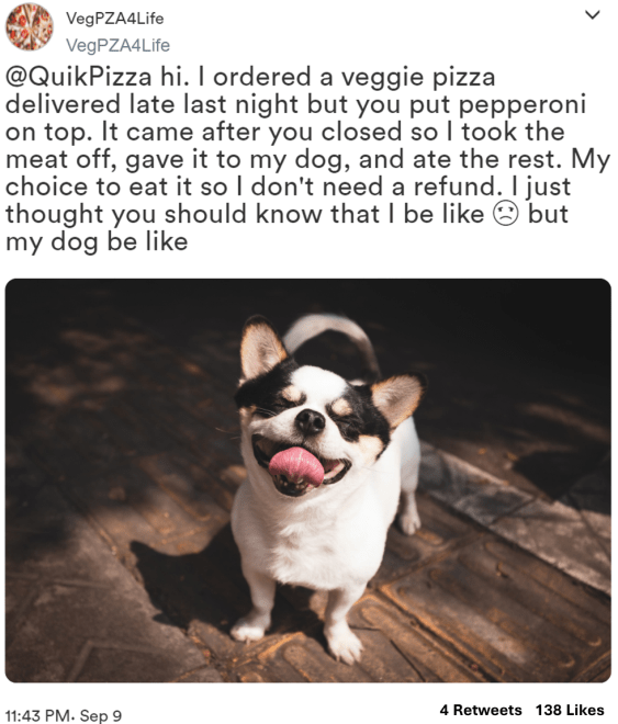 Social media post saying that the person received a meat pizza instead of a vegetarian one with an image of a happy dog that ate the meat.